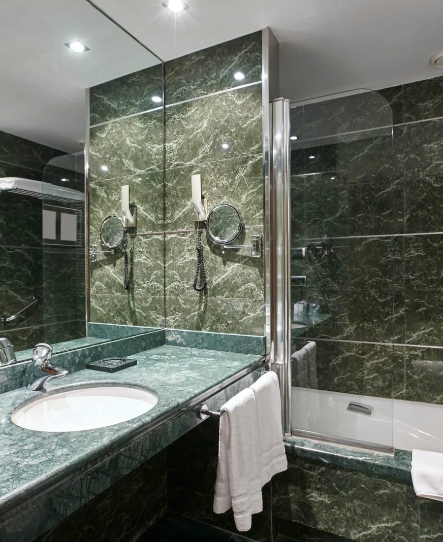 luxury-bathroom-in-green-marble-decoraton-hotel-home-interior-horizontal-1